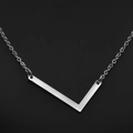 Minimalist V-shaped geometric pendant necklace in silver finish with polished metal chain - White Letter L