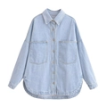Detailed view of light blue denim jacket with large utility pockets and metal buttons - Denim Blue 2