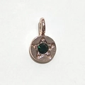 Rose gold circular pendant featuring a green star gemstone and clear accent stones - Rose Gold May