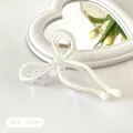 Elegant 11cm jelly white bow hair claw clip with transparent acrylic and gold metal spring - Cream