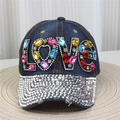 Close-up of denim baseball cap with colorful rhinestone LOVE letters and silver studs - No.8/Dark Blue Denim/Colorful LOVE