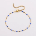 Gold stainless steel bracelet featuring blue enamel charms and adjustable lobster clasp - Gold + Royal Blue Enamel