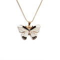 Gold butterfly necklace with black and white enamel and colorful crystals on a thin chain - White
