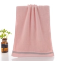 Pink cotton face towel with water ripple texture and elegant grey stripe design - Youth Pink