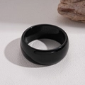 Detailed view of a wide black resin geometric bangle with a glossy finish on textured stone - Wide Surface Round Ring Style / 3# Bangle-Black