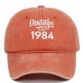 Detailed close-up of Vintage 1984 white embroidery on orange washed cotton baseball cap - Adjustable / Orange