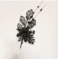 Detailed view of black glitter artificial lily branch with sequins for gothic decor - Black