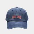 Close-up detail of vintage blue washed denim baseball cap with New York embroidery - Adjustable / Navy Blue
