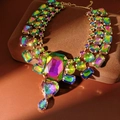 Detail shot of chunky iridescent crystal necklace with heart and teardrop pendants - Gold-Multicolor