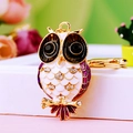 Sparkling white and purple owl keychain with crystal rhinestones in golden metal finish - A430 Owl K Purple