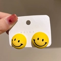 Detail view of yellow smiley face earrings on Reina display card for women - Yellow-Smiley Face (925 Sterling Silver Earring Post)