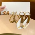 Set of 3 earrings featuring golden bows, twisted hoops, and marble resin patterns - Bow/Resin Splicing (13# Silver Earring Post)