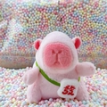 Pink capybara plush keychain with a green strap and a lucky white embroidered mini bag - Pink Red Fortune + Bead Chain