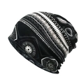 Macro detail of elastic knitted beanie featuring bohemian ethnic geometric patterns - M (56-58cm) / Black