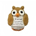 Handmade brown crochet owl doll holding a wise message card for stress relief - Owl