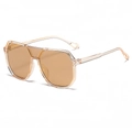 Champagne oversized aviator sunglasses with brown lenses and sleek open-hole temples - Tea Frame Tea Lens