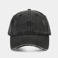 Detailed macro view of distressed brim edges on a charcoal washed cotton baseball cap - Adjustable / Black