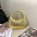 Elegant gold crescent evening bag with quilted diamond pattern and metallic handle - Light gold