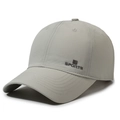 Gorra deportiva transpirable gris claro para hombre con logotipo lateral y tejido técnico - Gris claro
