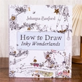 Malbuch How to Draw Inky Wonderlands von Johanna Basford auf einem Holztisch - Englische Version Wonderlands