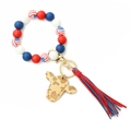 Wristlet keychain with red, white, blue beads, cow print bullhead and bicolor tassel - US Flag Theme
