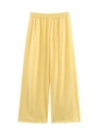 Detail of light yellow wide-leg lounge pants with elastic waist and silky texture - XS / Yellow Pants
