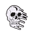 Macro shot of skull enamel pin with melting effect in black and white finish - Melting Fluid Skull