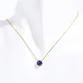 Detail of September royal blue birthstone pendant on a gold stainless steel necklace - September Royal Blue (Sapphire Color)