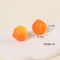 Mini juguete antiestrés de TPR variante melocotón de 1 cm con acabado degradado naranja - Melocotón Naranja