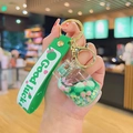 Cute green liquid sand acrylic keychain with a Good Luck strap and golden metal clasp - Green Quicksand Series-Gas Tank
