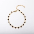 Elegante bracciale in acciaio inossidabile placcato oro 18k con cuori neri e chiusura a moschettone - 17+5cm / Nero