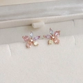 Macro shot of colorful zircon flower earrings on beige velvet in a luxury jewelry box - 11# 25068a