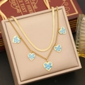 Dettaglio di collana dorata a due strati con cinque ciondoli a cuore blu malocchio su scatola - 1# Collana