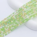 Macro view of 2mm square glass beads in light green and yellow for DIY jewelry making - Multicolor 8 (Yellow Grass Green)