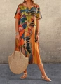 Full shot of model in colorful abstract print short sleeve maxi dress with straw bag - S / Dresses / Yellow