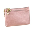 Pink genuine leather coin purse with lychee texture and heart zippers in variant view - Rose Gold