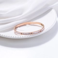 Elegant rose gold stainless steel bracelet with white marble inlay and sparkling crystals - Rose Gold