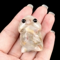 Polished natural agate stone phallic-shaped figurine with decorative eye details - Crazy Agate
