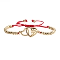 Adjustable red rope bracelet with double golden hearts and shimmering zircon stones - Double Heart Copper Beads Red Rope / Gold + Red Rope
