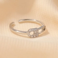 Adjustable silver pin-shaped ring featuring sparkling crystal accents on a soft background - White K Pin Belt Buckle Ring (5968)