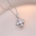 Vintage silver rotating flower cross necklace with sparkling cubic zirconia on silk - X1224 Rotating Four-leaf Flower