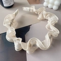 Serre-tête élégant à volants en organza crème avec un design plissé doux - Abricot