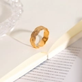 Detail of gold-plated twisted texture on an adjustable stainless steel ring - Wave Pattern Open Ring