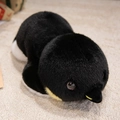 Süßer realistischer Plüsch-Pinguin in schwarz-weißer Liegeposition für Kinder - Liegender Pinguin / 35cm