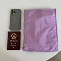 Close-up of a purple nylon zipper organizer bag with a smartphone for size reference - 30*23 / Purple