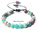 Close-up of 8mm natural stone beads on a handmade adjustable woven cord bracelet - Shoushan Stone