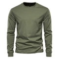 Detail of olive green cotton shirt showing white hem label and neckline brand tag - Army Green
