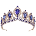 Detailed close-up of golden baroque bridal crown featuring deep blue oval gemstones - KC Gold White & Sapphire Blue Rhinestone