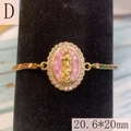 Detail of Virgin Mary Guadalupe oval charm with colorful zircon stones and gold bracelet - Style D-Pink