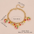 Gold stainless steel bracelet featuring colorful fruit charms and bright beads - Citrus Platter Bracelet